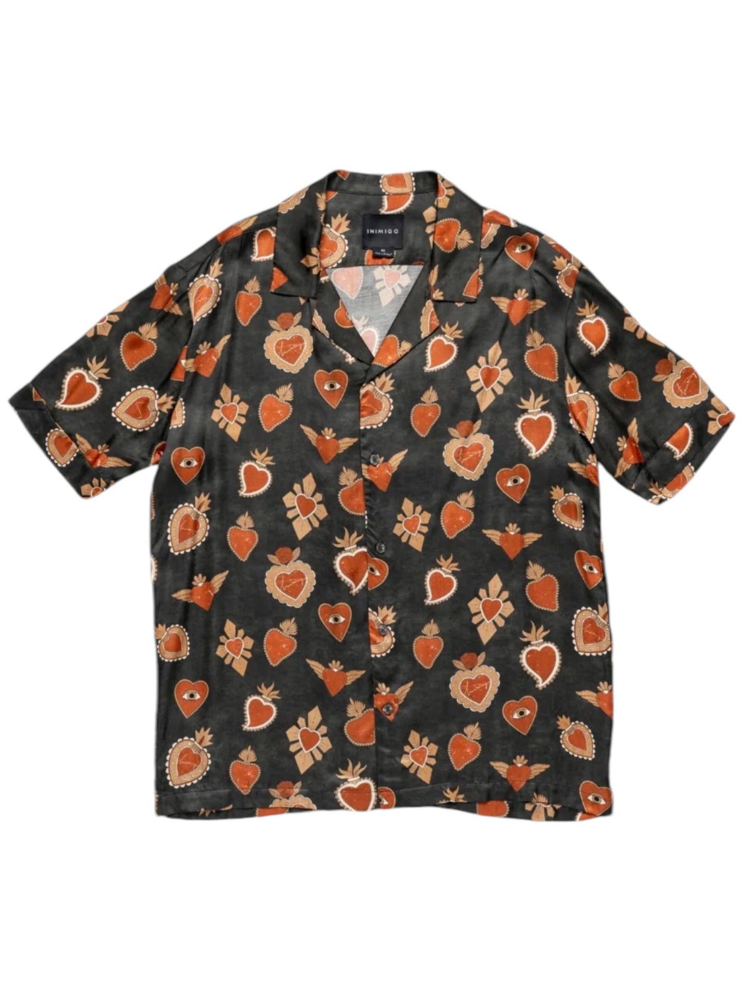 The INIMIGO ISH3527 Mexican Hearts Shirt Black is a short-sleeved, button-down shirt that features a dark base embellished with orange hearts and geometric shapes, merging vibrant style with classic design.