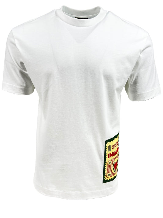 The INIMIGO ITS3539 MEXICAN T-SHIRT WHITE is a plain white, short-sleeve tee crafted from 100% cotton, featuring a distinctive, colorful patch near the bottom hem on the front right side.