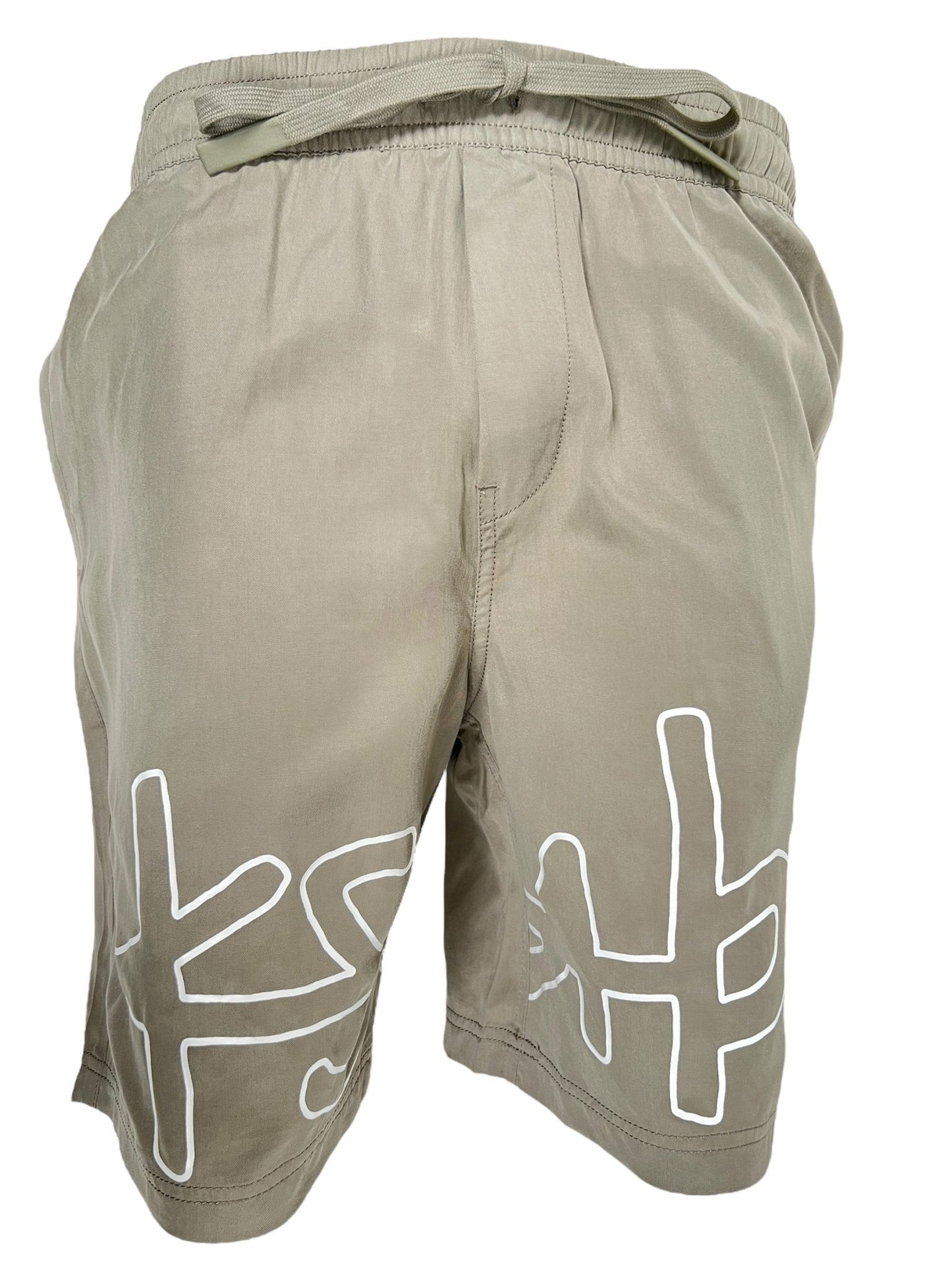 Beige drawstring, wide leg shorts, featuring white abstract designs on the front, crafted from khaki tencel fabric. Perfect for a casual outing or your next KSUBI 1999 LIFE SHORT OUTBACK GREEN adventure by KSUBI.