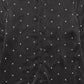 The KSUBI Polka Plus Ls Shirt Black is a stylish polyester button-up with long sleeves, featuring small white cross patterns for a sleek look.