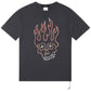 The Ksubi Skull Biggie Ss Tee in faded black by KSUBI showcases a striking skull and flames graphic on the front. Made from premium cotton, it offers ultimate comfort in an oversized fit.