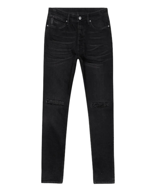 A pair of KSUBI VAN WINKLE APEX KRYSTAL REPAIR BLACK jeans by KSUBI, with a distressed design on the knees, five-pocket styling, and button closure.