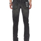 A person is seen from the back wearing KSUBI’s Van Winkle Torqued Chamber Black skinny jeans, featuring faded black denim, patch details on the right pocket, and visible stitching for a modern look.