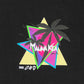Introducing the Mauna-Kea Mku100-P999 Sunset Palms Tee Blk by MAUNA-KEA—a chic graphic tee featuring a retro design with overlapping triangles, vibrant palm trees, and bold "MADARCA" text on a sleek black background. It is adorned with small wave, leaf, and cup icons for added flair. Crafted from 100% cotton to ensure ultimate comfort.