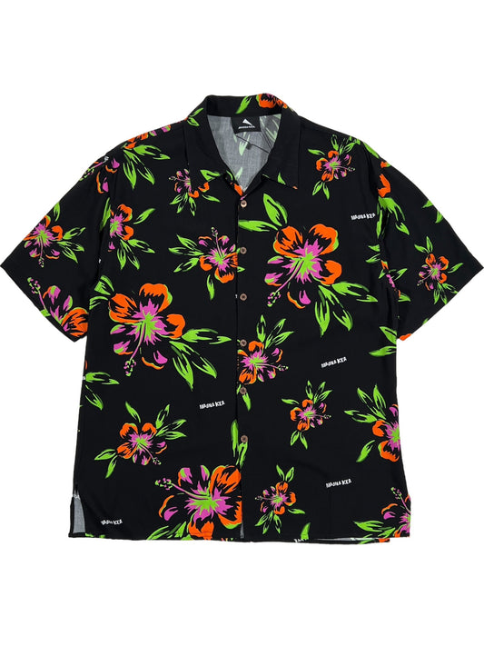 A vibrant short-sleeved MAUNA-KEA MKU142-FL FLORAL SHIRT BLK with a bold graphic roses print in orange, green, and purple, made in Italy and displayed on a flat surface.