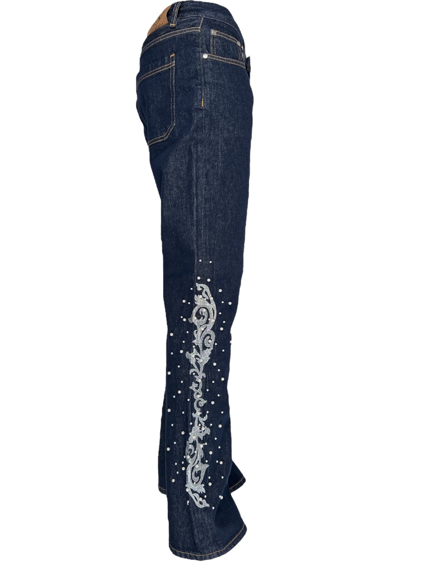 The BIRTH OF ROYAL CHILD Only The Blind BC25SSPT22 Raw Pearl Flared Jeans Blue feature dark blue raw denim, white embroidery, and small studs along the outer side seam.