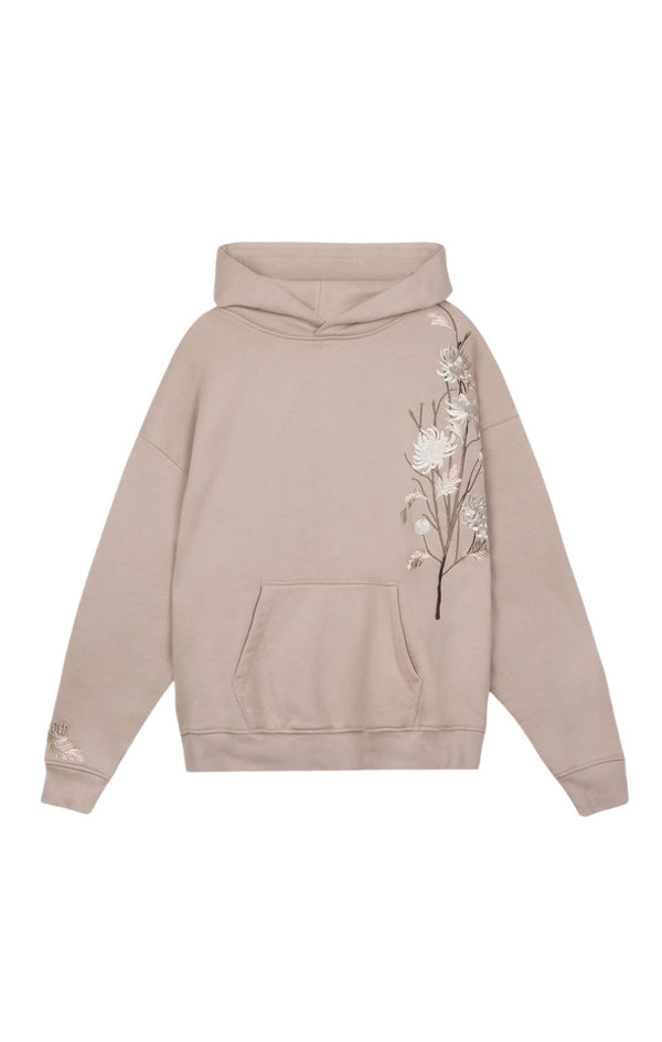 The Only The Blind OTB-H1033 Ogiku Embroidered Hood by ONLY THE BLIND is a beige heavyweight cotton hoodie adorned with an embroidered blossom design on the right side, complete with a front pocket and hood, ideal for enhancing your summer shade collection.