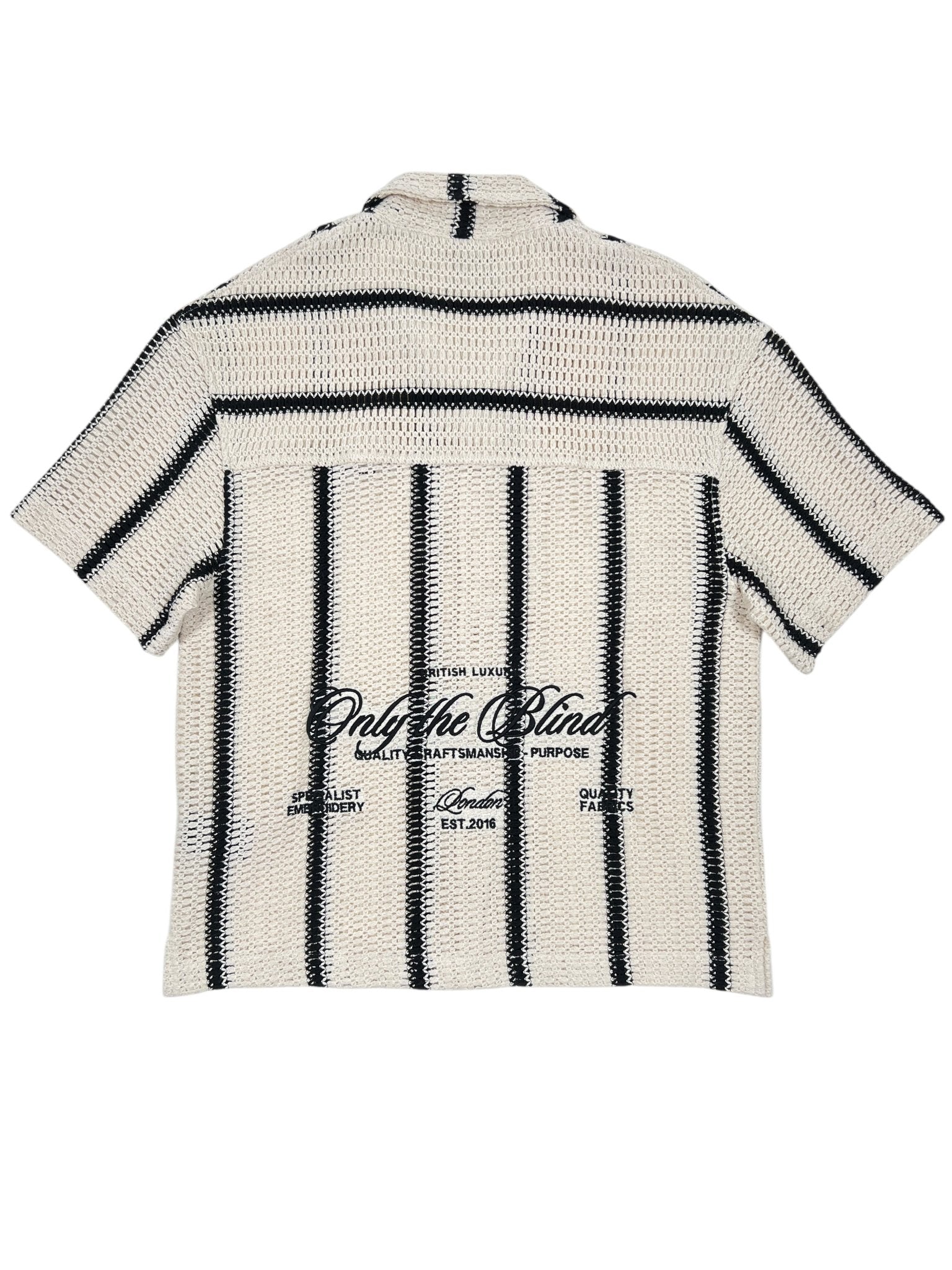 The Only The Blind OTB-SH1520 Desert Stripe Crochet Shirt, featuring beige and black stripes and back text details, showcases the unique style of ONLY THE BLIND.