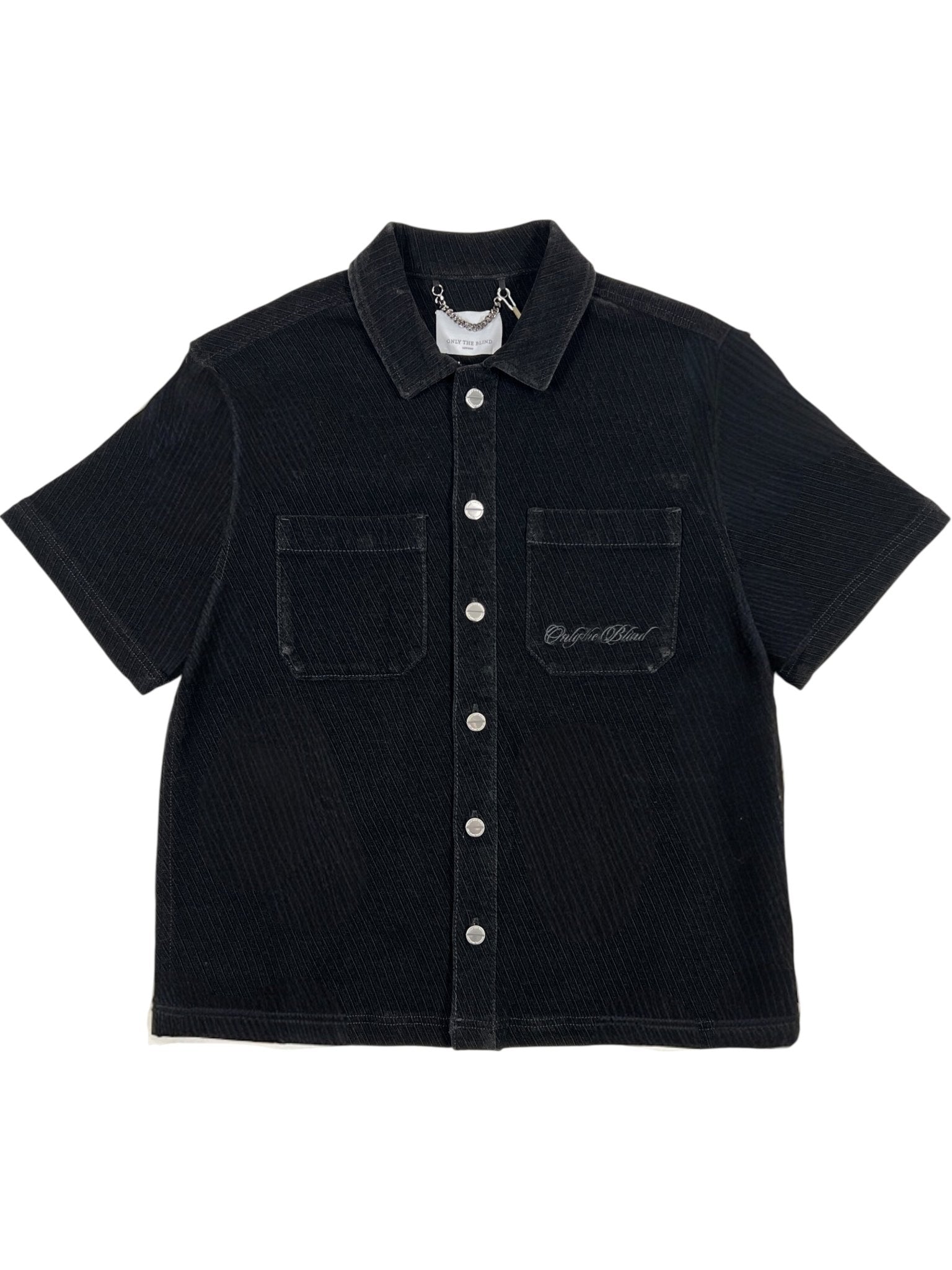 The Probus Only The Blind OTB-SH1572 Noir Heritage Shirt Black features short sleeves, two chest pockets, a collar, and a small embroidered script on the left pocket.