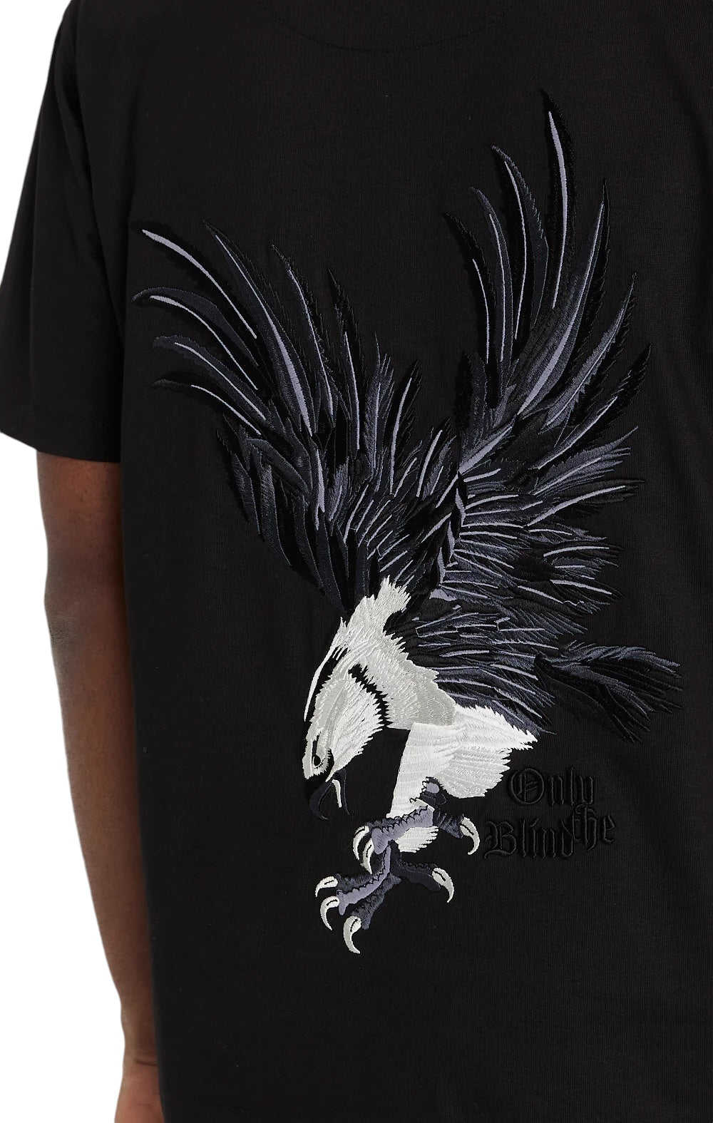 From the ONLY THE BLIND brand, the Only The Blind OTB-T1357 Midnight Hawk T-Shirt in Black is part of the WILDWOOD collection, featuring a large embroidered eagle in flight with intricate detailing on organic cotton fabric.