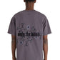 Dressed in the ONLY THE BLIND OTB-T1383 Wildflower T-shirt in purple with floral embroidery and light jeans.