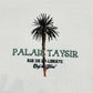 The ONLY THE BLIND OTB-T1486 Palais Taysir T-shirt Beige features a palm tree graphic and "PALAIS TAYSIR RUE DE LA LIBERTE Only the Finest" text on organic cotton with light fabric.