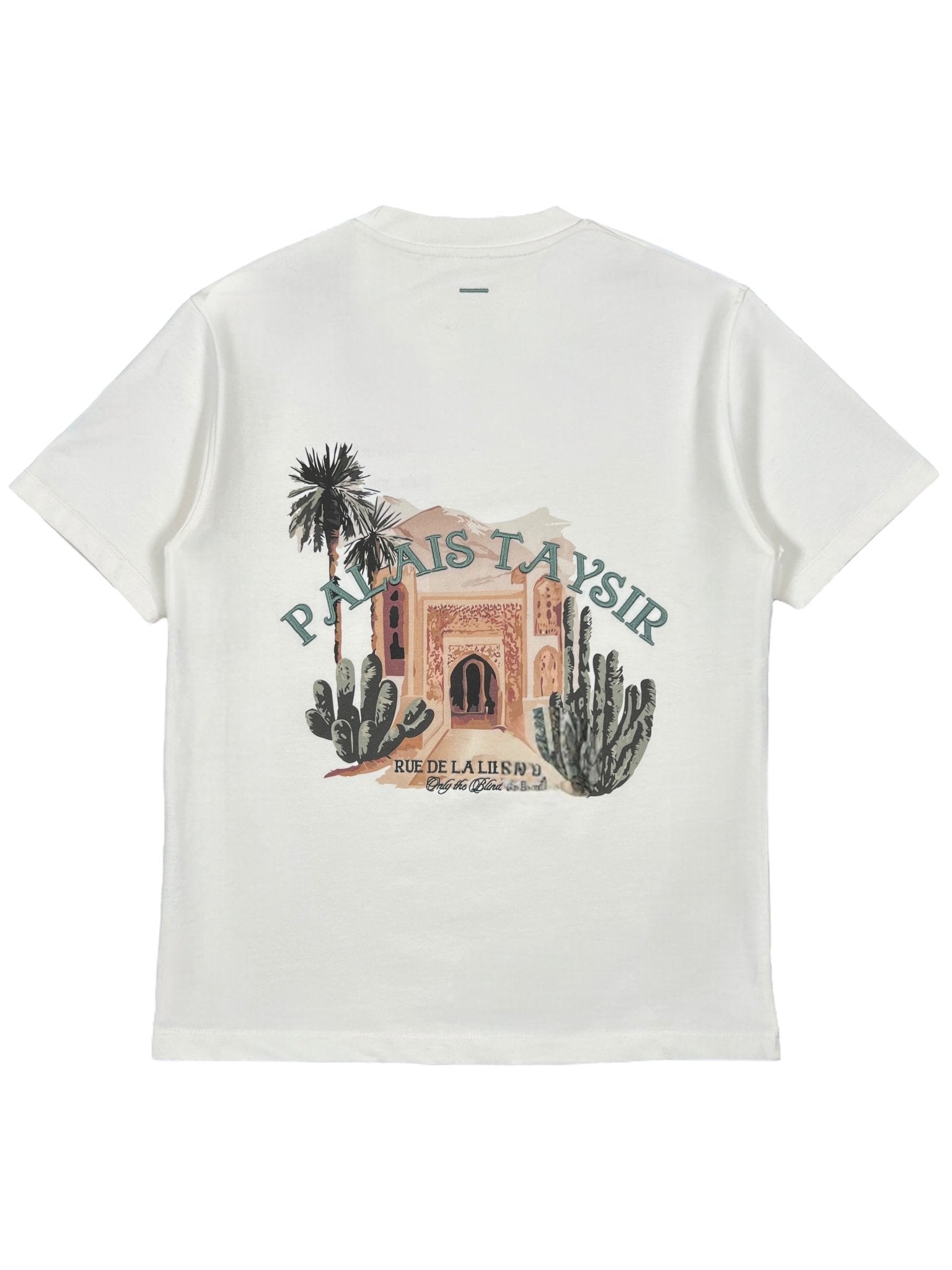 The Only The Blind OTB-T1486 Palais Taysir T-shirt in beige features organic cotton, an illustrated scene of an arched building, cacti, palm trees, and "PALAIS TAYSIR" and "RUE DE LA LIBERTE" text on the back.