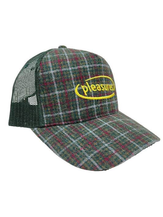 A green and red plaid PLEASURES HAPPIER PLAID TRUCKER GREEN hat with a green mesh back and a yellow oval logo on the front, proudly displaying the word "pleasures." Made from durable polyester, this stylish accessory combines comfort and fashion effortlessly.