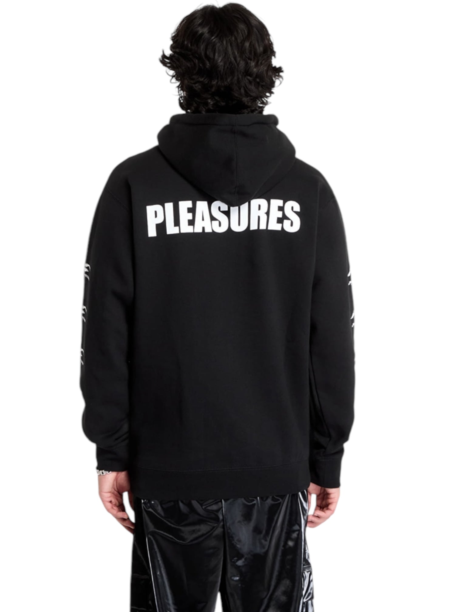 Someone wearing the Pleasures Illegal Hoodie by PLEASURES, a black cotton hoodie with "PLEASURES" in white on the back.