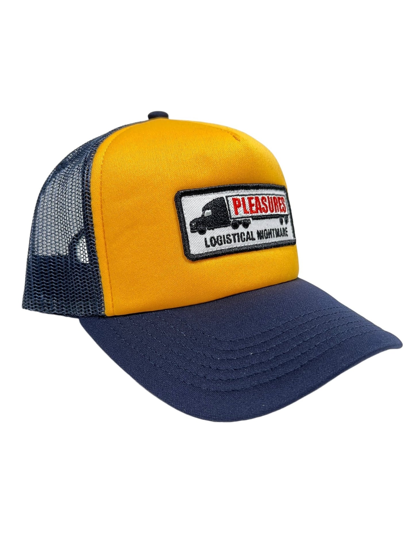 The PLEASURES NIGHTMARE TRUCKER hat in navy and yellow features a black mesh back, crafted from nylon and polyester. This trucker hat includes a patch with the word "PLEASURE" above an image of a truck and the text "LOGISTICAL NIGHTMARE.