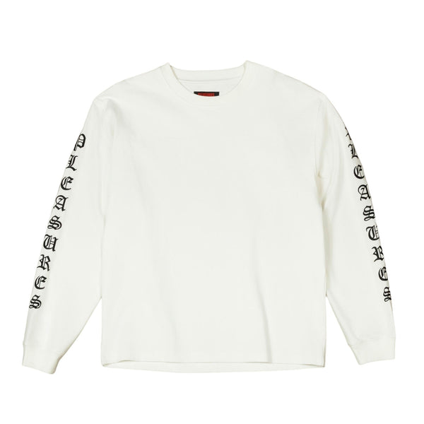 The Pleasures Oe Heavyweight Long Sleeve White shirt is a crisp white long-sleeve featuring black "PLEASURES" text branding on both sleeves.