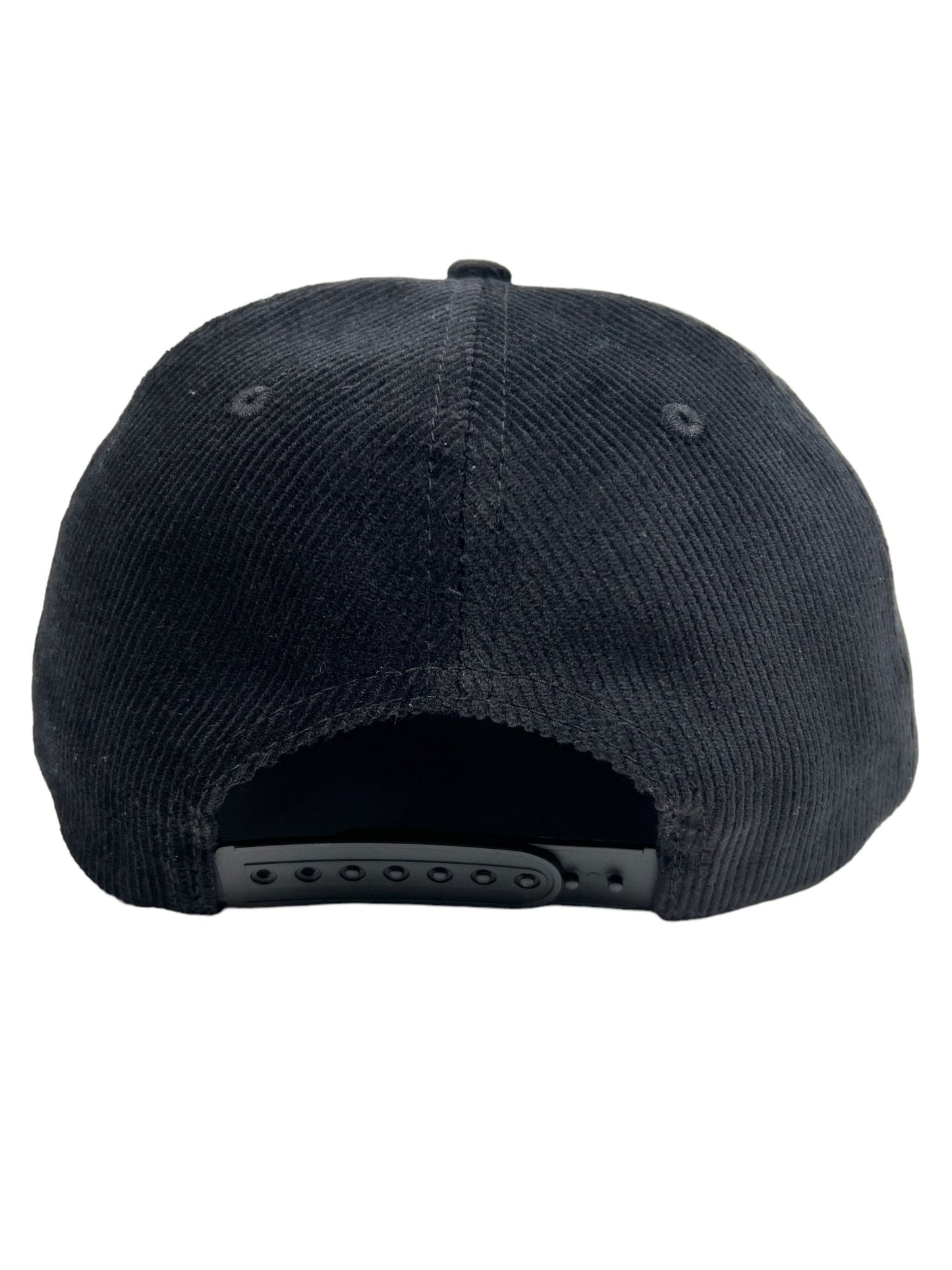 Back view of the PLEASURES ONYX CORDUROY SNAPBACK ONYX, a black corduroy baseball cap with a snap closure, featuring subtle PLEASURES branding.