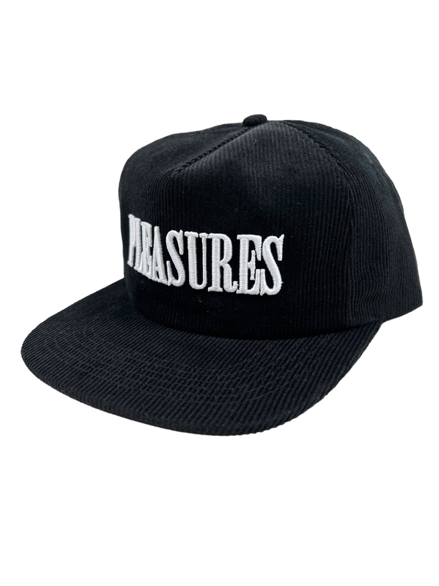 The PLEASURES ONYX CORDUROY SNAPBACK ONYX is a black corduroy baseball hat featuring the word "PLEASURES" embroidered in white on the front.