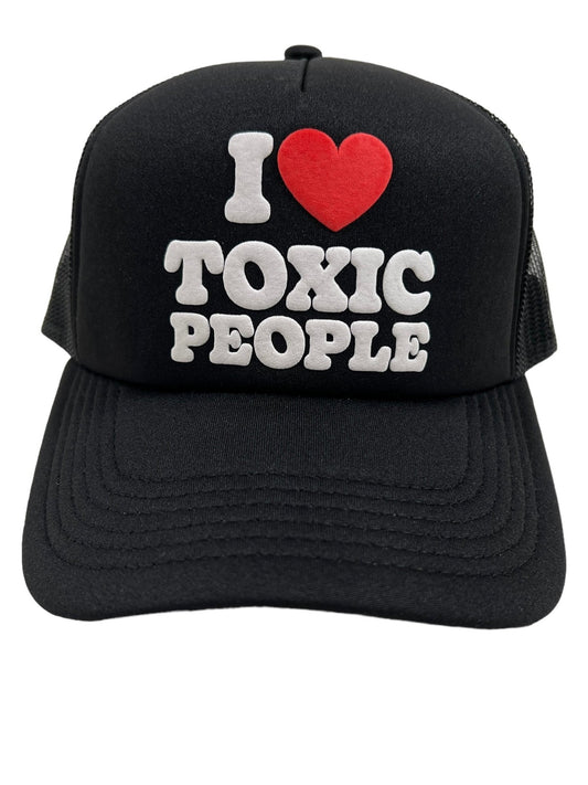PLEASURES TOXIC TRUCKER CAP GREY by PLEASURES with the phrase "i ❤️ toxic people" printed on the front, transforming it into a stylish accessory.