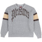 The Pleasures Twitch Chunky Knit Sweat Grey by PLEASURES is a cozy sweater with "Pleasures" in black across the chest. Crafted from a soft wool blend, it features stylish brown and beige stripes on each sleeve.
