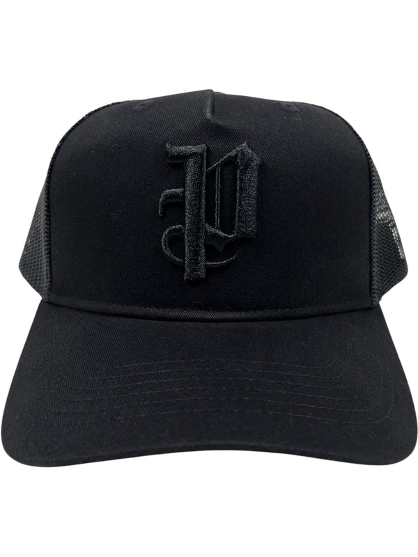 The Purple A2054-TTGT224 Cotton Twill Trucker Hat by PURPLE BRAND features a black mesh back and a raised Old English "P" embroidered on the front.