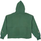 The PURPLE BRAND M4104-HFGH425 Heavyweight Fleece Hoodie in green features a back view, visible seam lines, and paint splatters on both sleeves, crafted from heavyweight cotton.