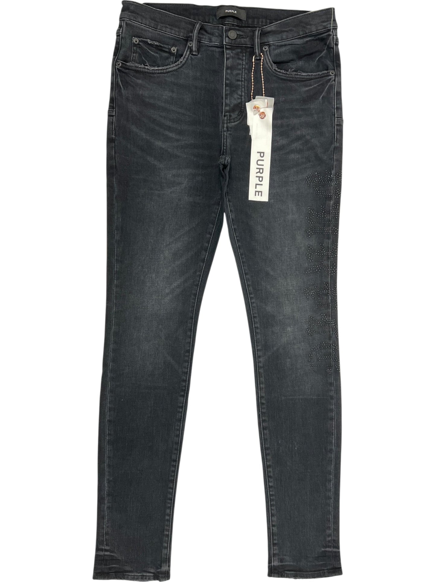 A pair of Probus Purple Brand P001-SHFL425 Skinny Hotfix Logo Black jeans with front and back pockets, visible seams, and a "PUPPLE" tag on the right belt loop.