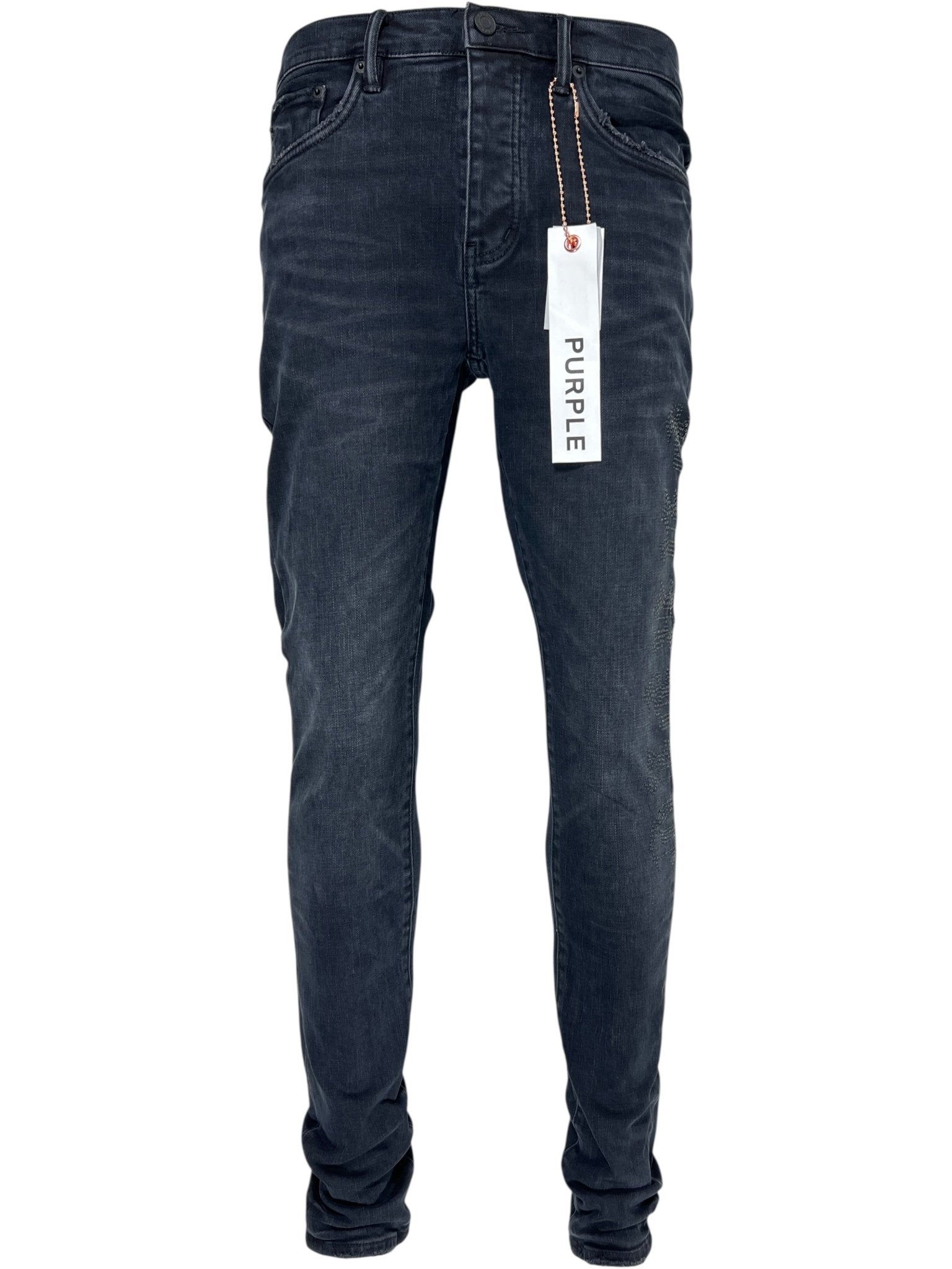 A pair of Probus Purple Brand P001-SHFL425 Skinny Hotfix Logo Black men's jeans is displayed upright with a white "PURPLE" tag attached to a belt loop.