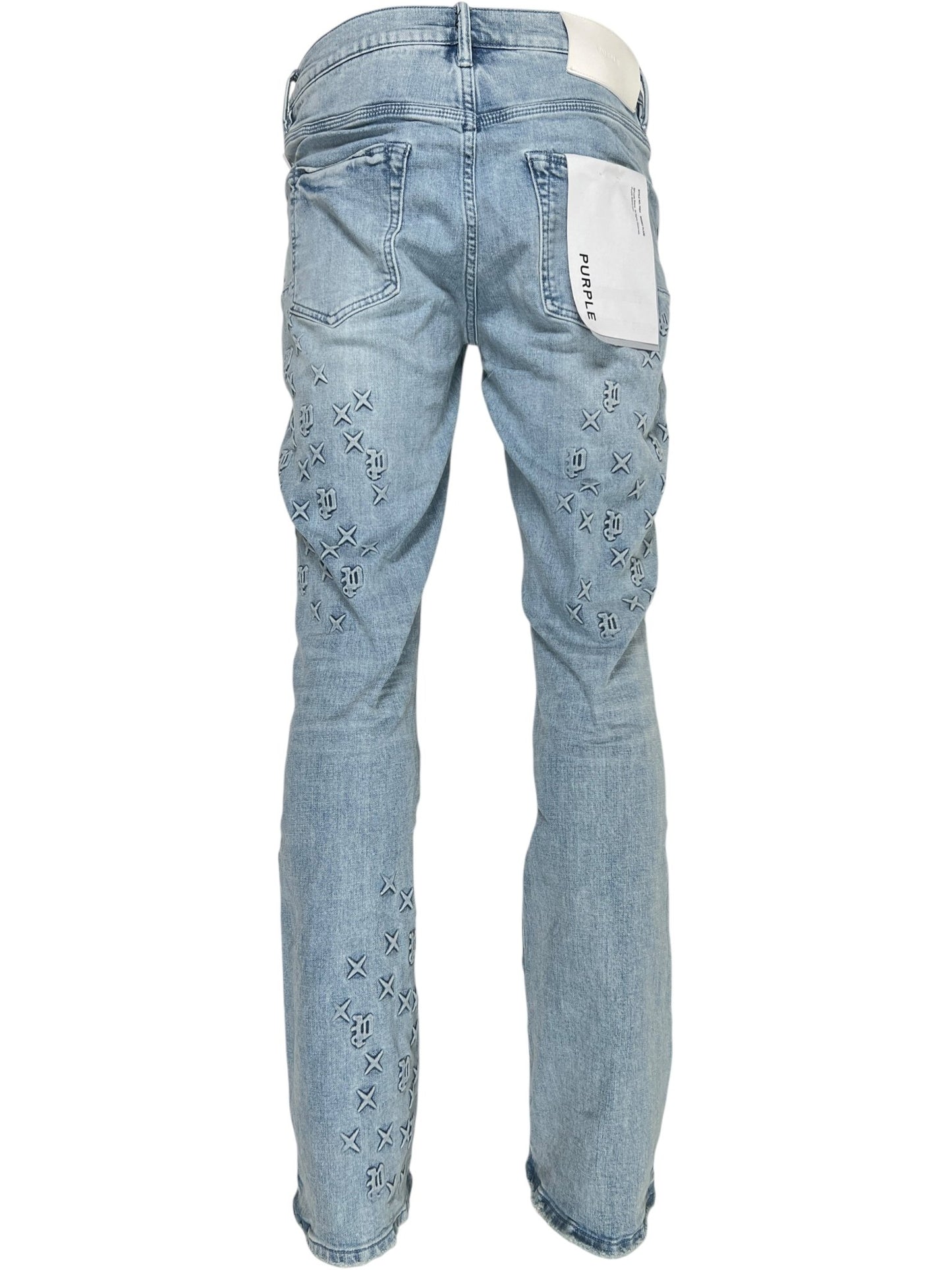 Back view of PURPLE BRAND P004-FOBL425 Flare Mono Embossed Indigo jeans in light blue with scattered embroidery, a prominent white waistband label, and subtle flared styling.