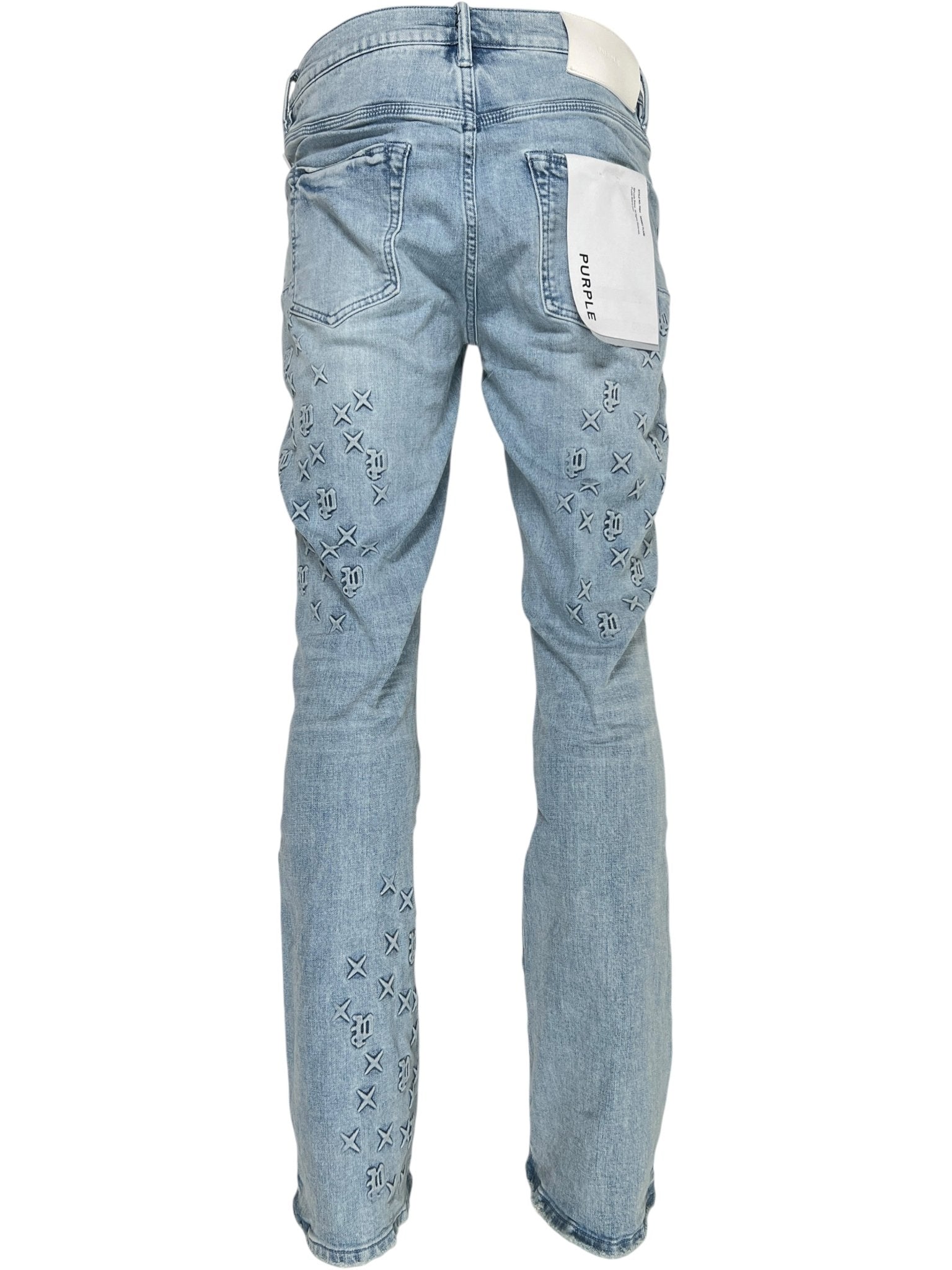 Back view of PURPLE BRAND P004-FOBL425 Flare Mono Embossed Indigo jeans in light blue with scattered embroidery, a prominent white waistband label, and subtle flared styling.