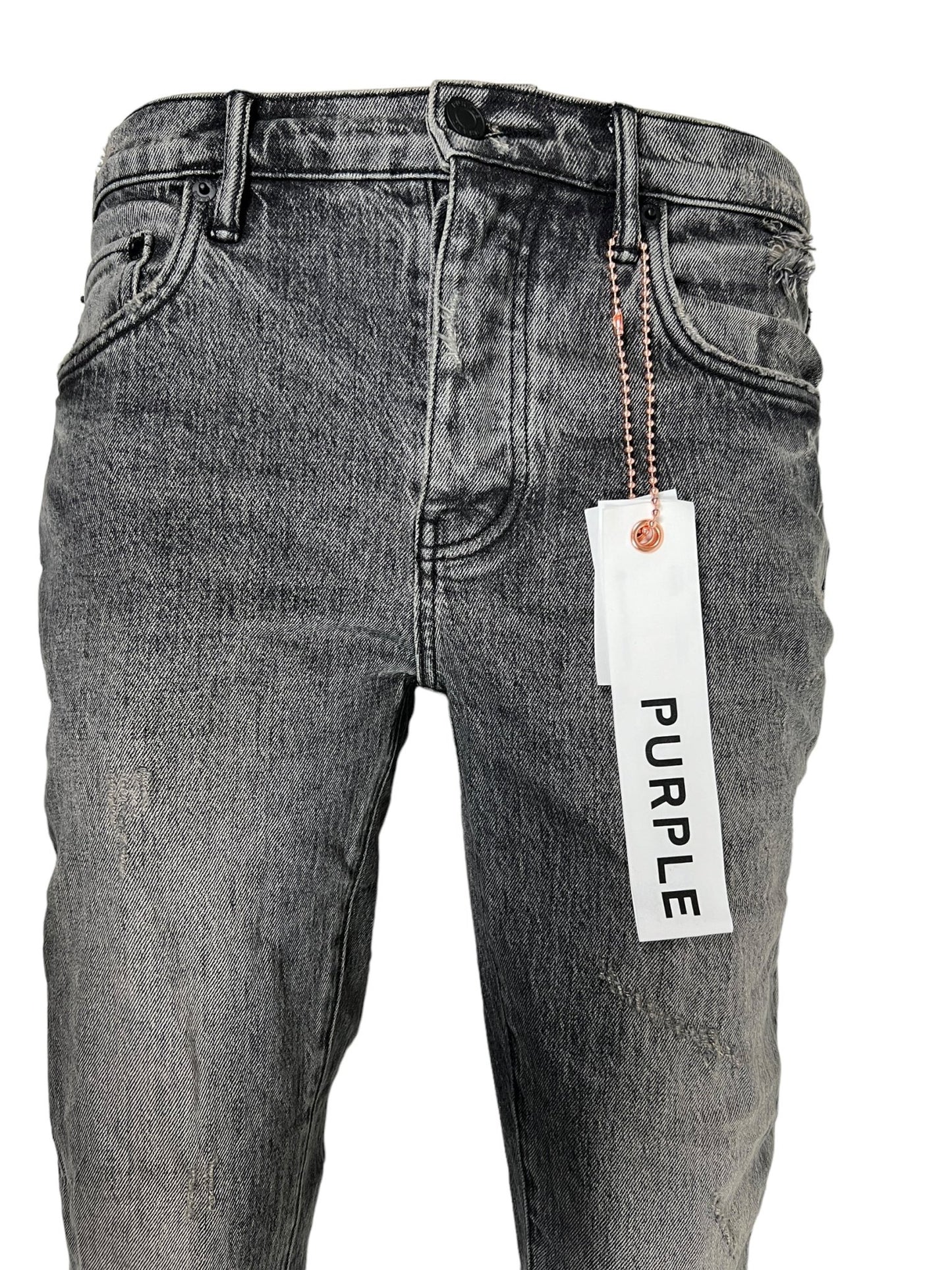 A pair of vintage flare blowout black jeans, crafted from soft cotton and exuding a vintage style. A white tag reading "PURPLE" is attached to the belt loop, indicating their PURPLE BRAND quality.