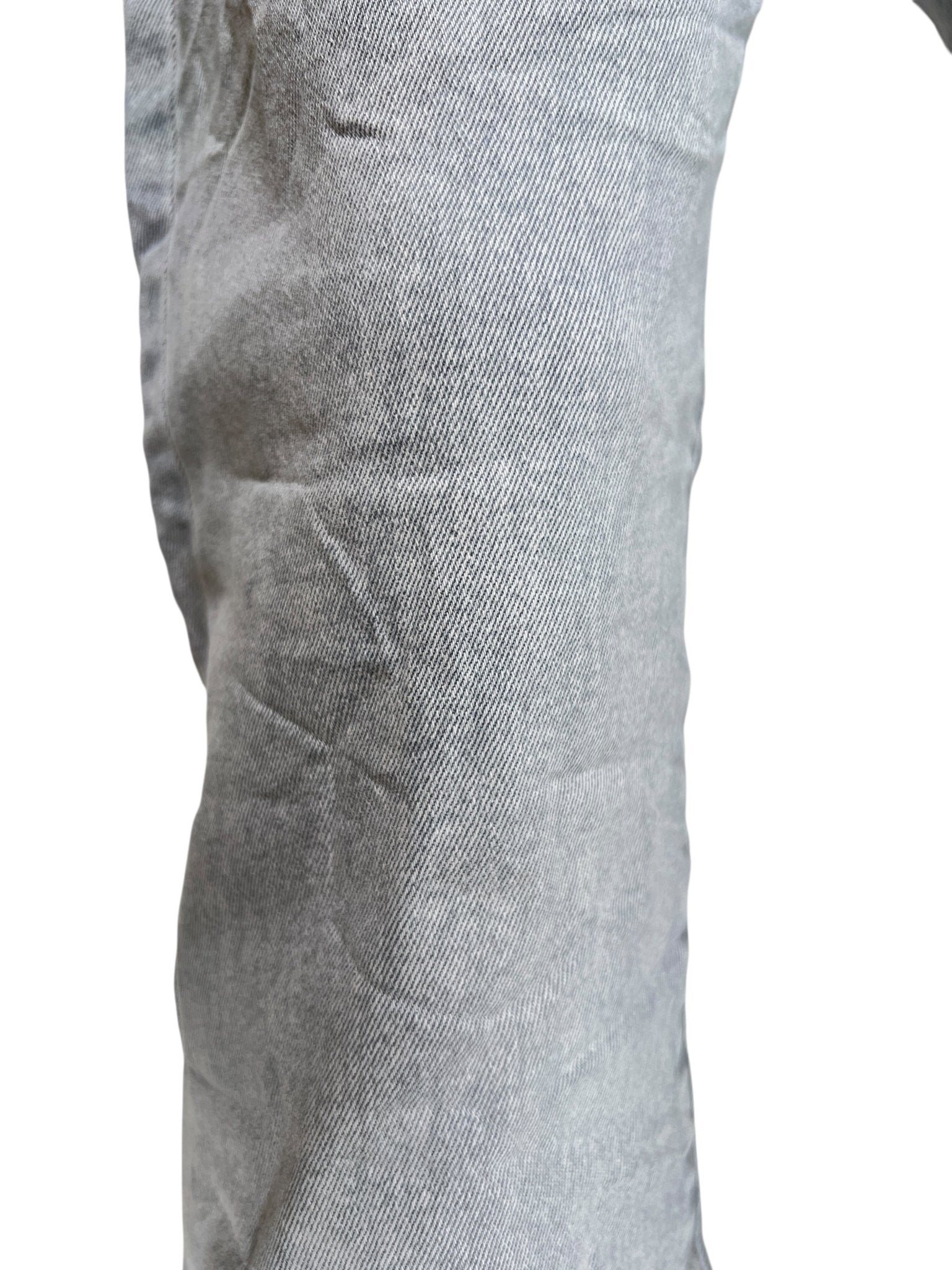 Close-up of PURPLE BRAND P005-AYDG325 Alloy Studs Overdyed Grey men's jeans in stretch denim, featuring visible creases and textured fabric.