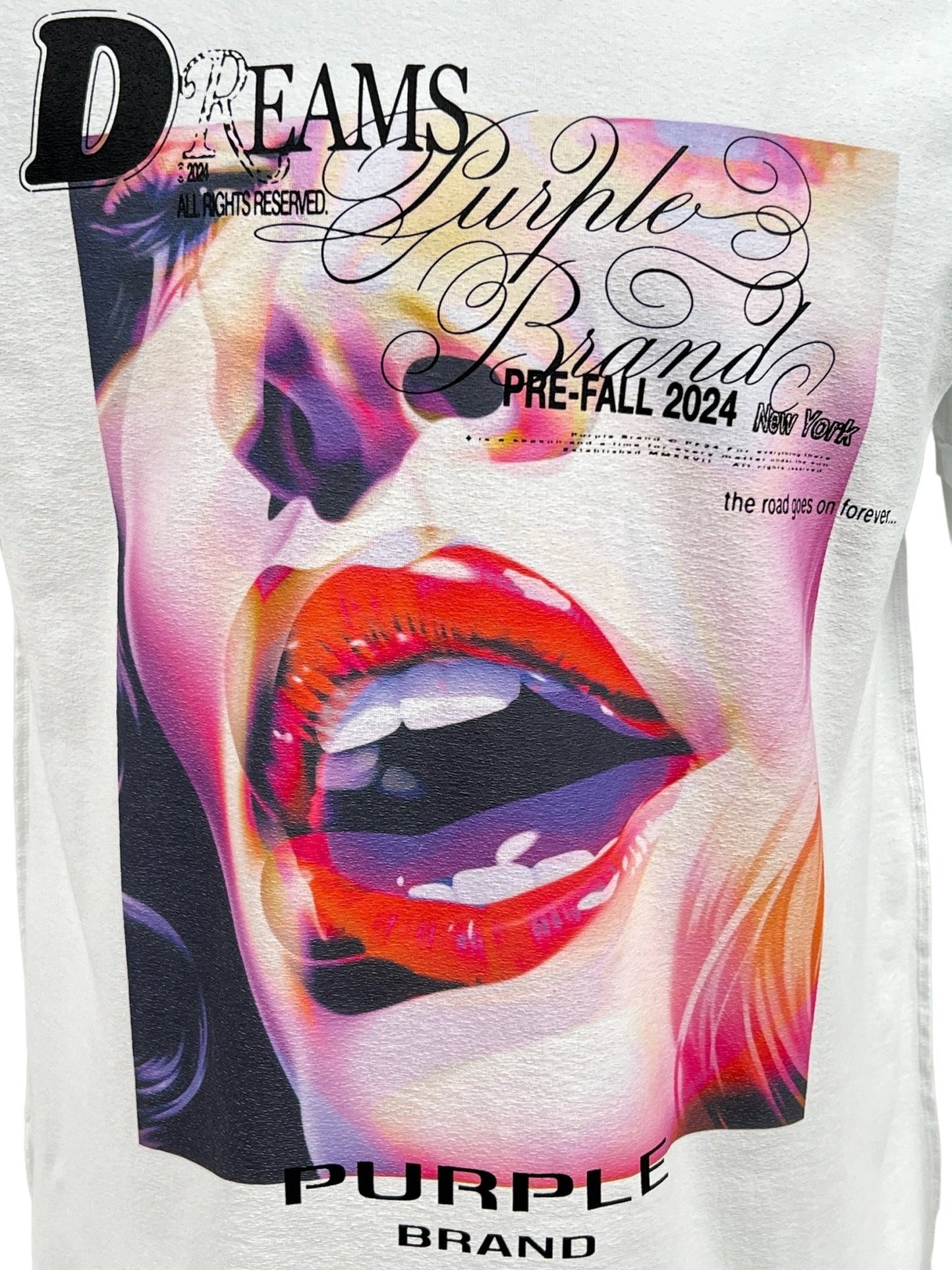 T-shirt with a colorful graphic of a woman's lips and eyes, featuring stylized PURPLE BRAND logo text "dreams purple brand pre-fall 2024 new york.