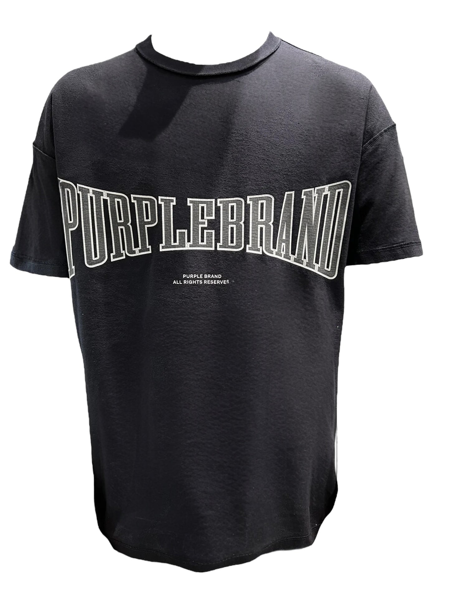 The Purple Brand P101-JHBB Textured Inside Out Tee Black, made from 100% cotton, showcases the "PURPLE BRAND" logo prominently in large white letters on the front.