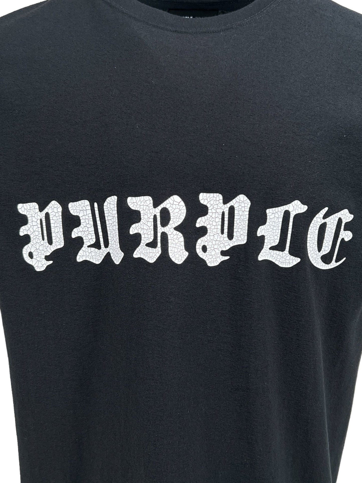 Purple Brand P104-JGBB textured jersey tee in black with the word "purpose" written in bold, stylized white gothic font across the chest.