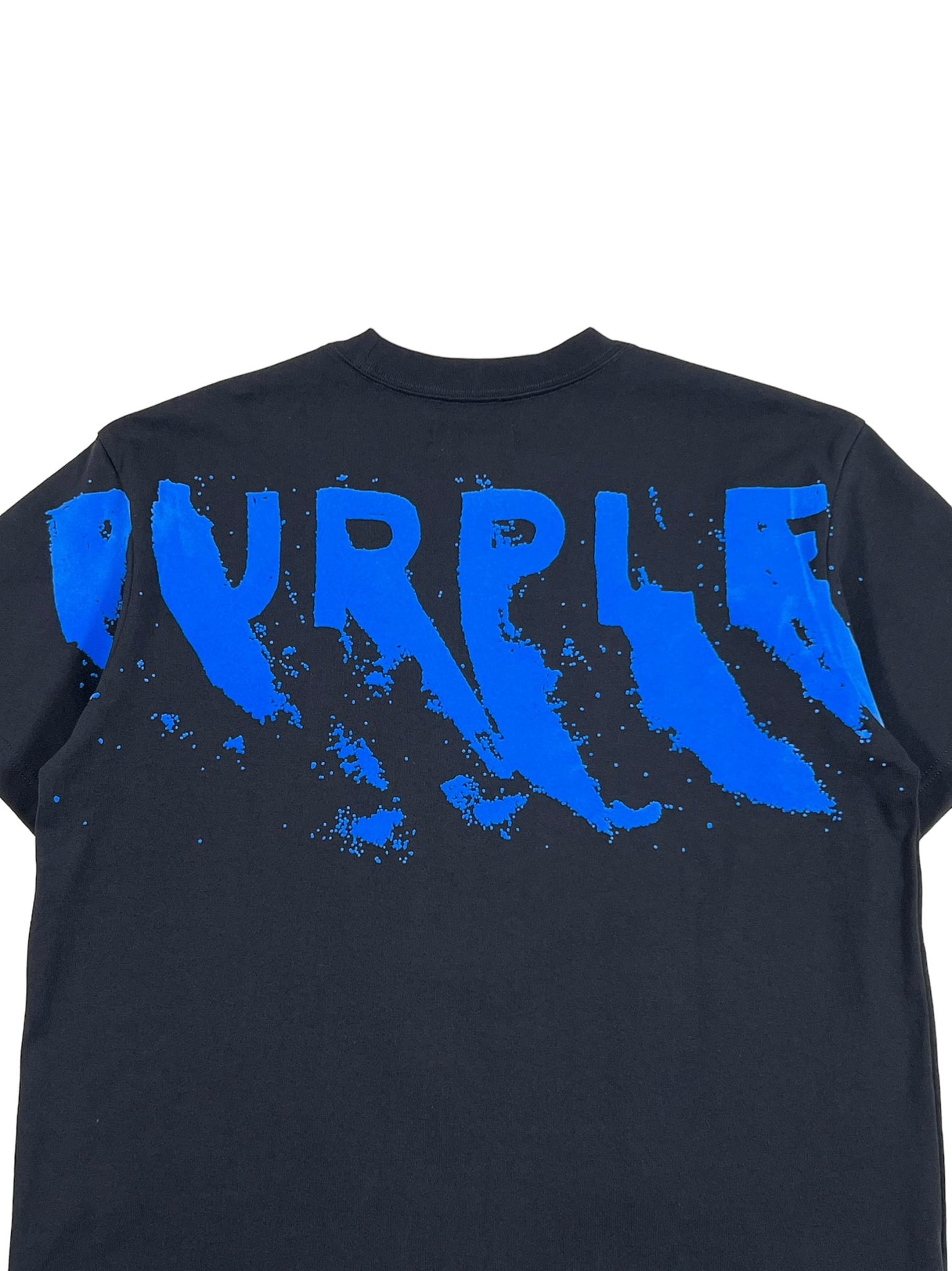 Navy t-shirt with the word "purple" splashed across in bold blue paint, featuring PURPLE BRAND graphic.