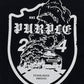 A tie-dyed effect surrounds a white, cracked shield emblem on the PURPLE BRAND P117-HWBB HWT Jersey SS Tee in Black. The graphic T-shirt features "Purple" and "24" in bold text, along with "Established MMXXVIII" at the bottom. The shield showcases an illustration of a smoking car front, and the tee is made from 100% cotton for ultimate comfort.