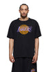 A man with braided hair proudly wears a Purple Brand P142-MNLA824 LA Lakers Mesh Tee Black, highlighting his status as a dedicated NBA fan.