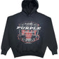 The PURPLE BRAND P401-HBBS HWT FLEECE PO HOODY in black features a "PURPLE" logo in white and red. This hooded sweatshirt is crafted from heavyweight cotton fleece and includes additional text and graphic elements. The vintage-vibe logo adds a nostalgic touch, while the convenient kangaroo pocket offers functionality.