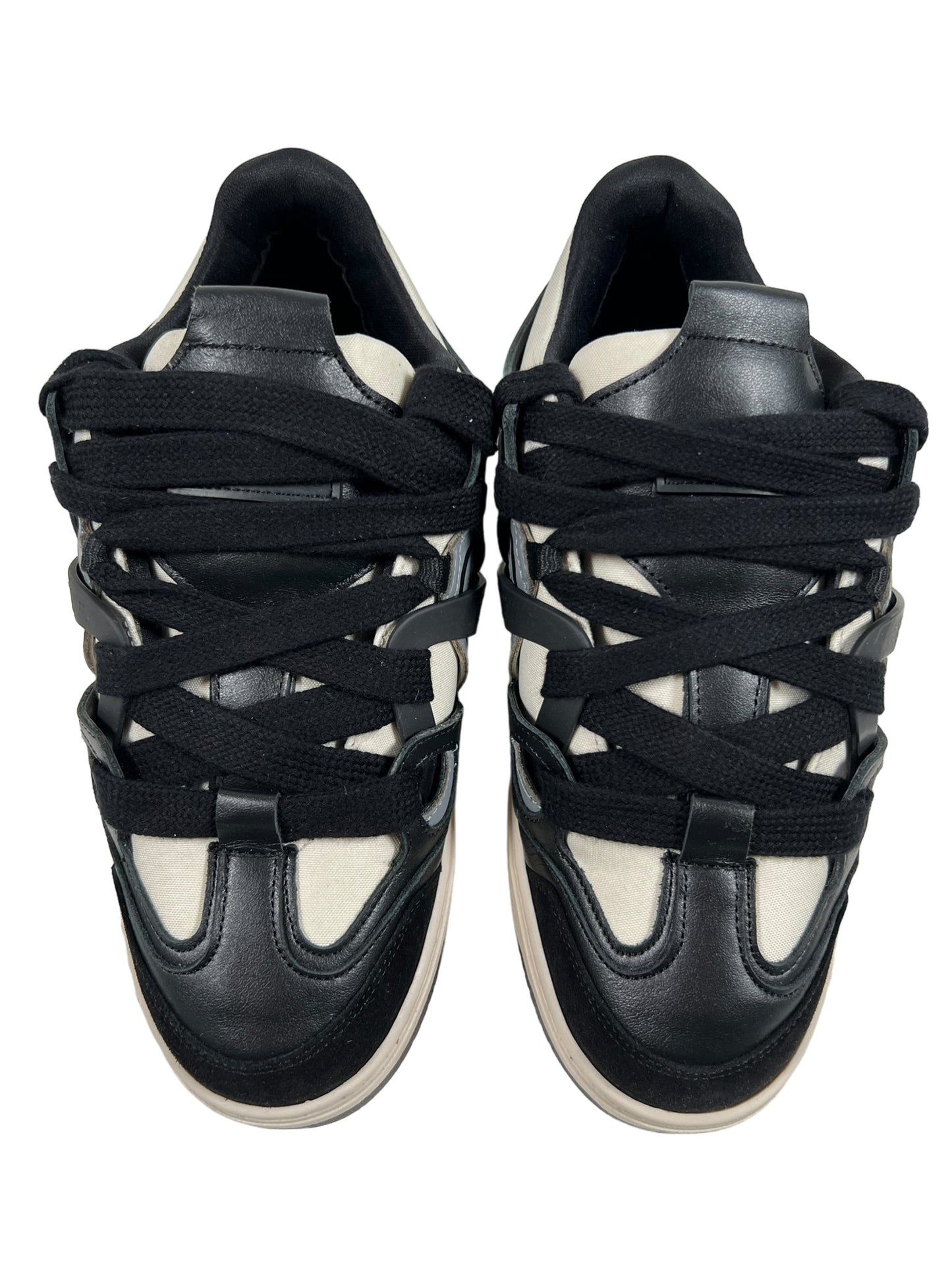 A pair of REPRESENT M12068-37 BULLY LEATHER BLACK sneakers with crisscrossing laces, viewed from above on a white background.