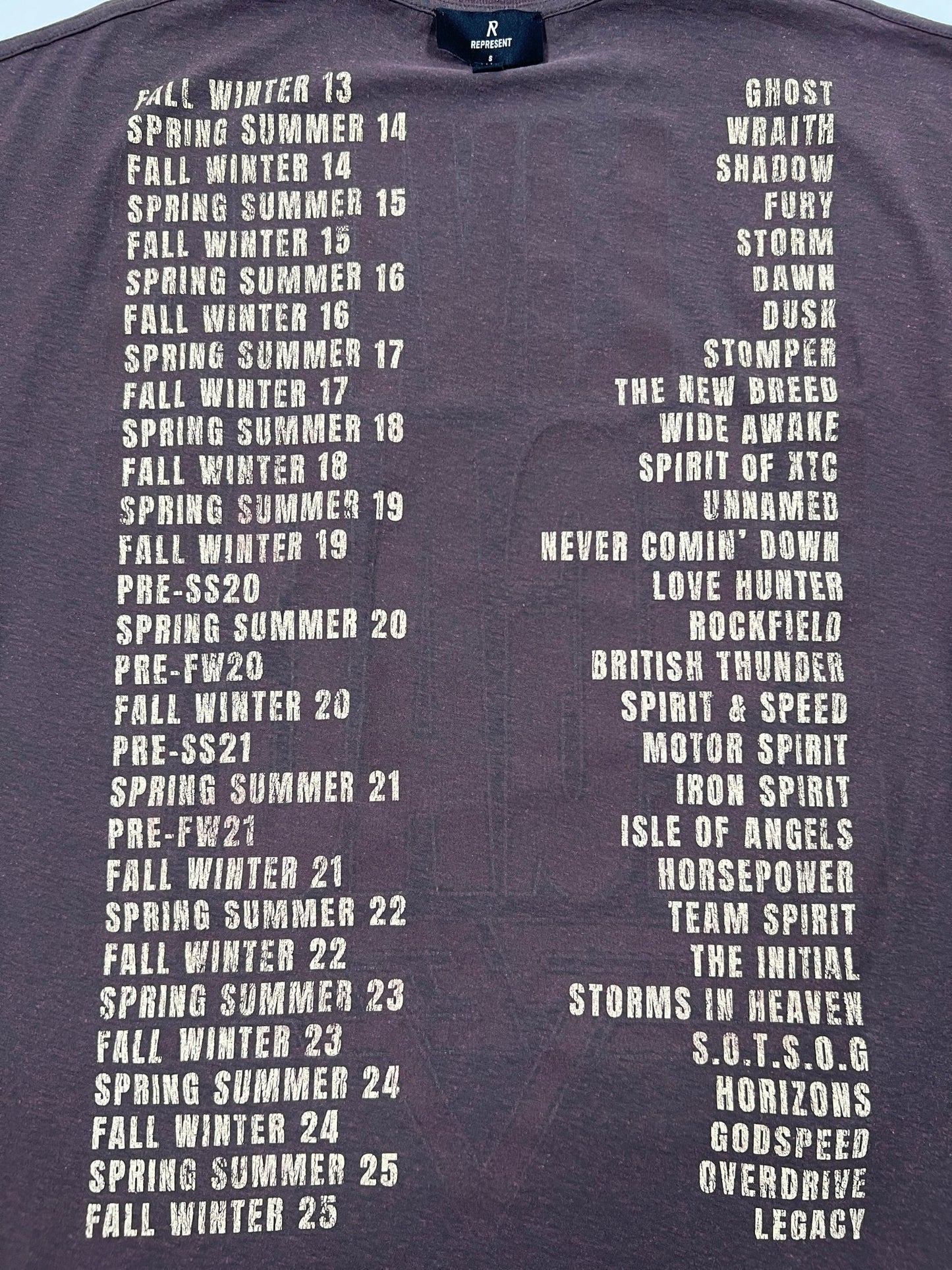 The REPRESENT MLM100176-17 Living Legacy T-shirt Nero showcases seasonal collections from Fall Winter and Spring Summer 2013–2025, each paired with a bold capitalized word or phrase on the right side.