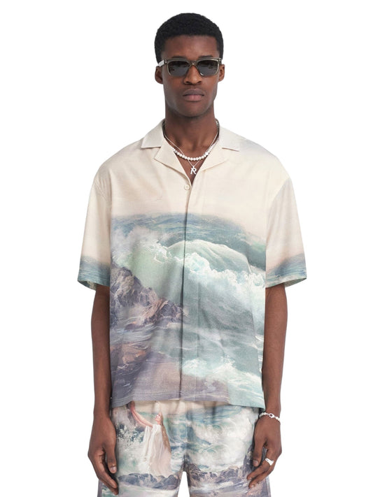 A man wearing sunglasses and a matching set of REPRESENT MLM206-137 HIGHER TRUTH PRINTED SHIRT MULT with full print artwork, standing against a plain white background.