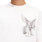 The individual is dressed in a soft jersey cotton Represent MLM41066 Elegance in Motion Tee in White, featuring a winged horse design and "REPRESENT" on the front.