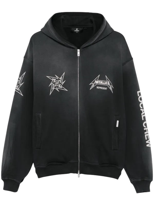 The Represent MLM4370 40 Year Anniversary Zip Hood Blk features an attached hood, star graphics, and the words "REPRESENT" and "LOCAL CREW," celebrating Metallica's legendary music history. Embrace iconic style with this special edition piece.