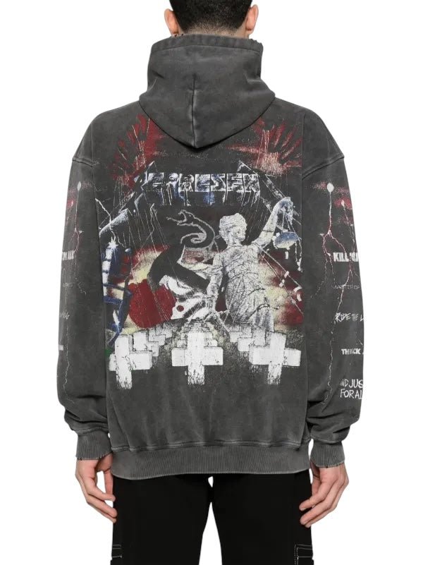 A person is seen from the back wearing the Represent MLM4374 Master Of Puppets Hood Grey by REPRESENT, showcasing a striking abstract and symbolic large graphic with crosses, text, and illustrations.