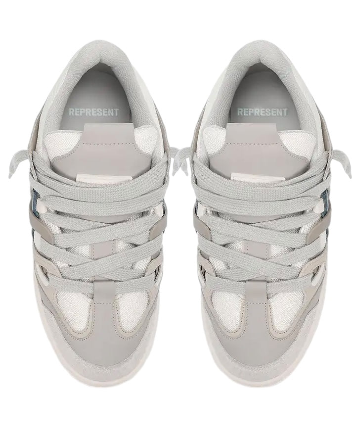 Top-down view of a pair of Represent MLM9599 Bully Grey sneakers showcasing multiple laces and the word "REPRESENT" inside. Crafted from luxury leather, these footwear items seamlessly combine style with durability.