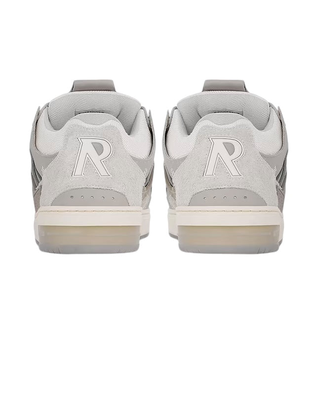 Back view of the Represent MLM9599 Bully Grey sneakers showcasing a large "R" on the heels, crafted with ballistic nylon mesh for enhanced durability.