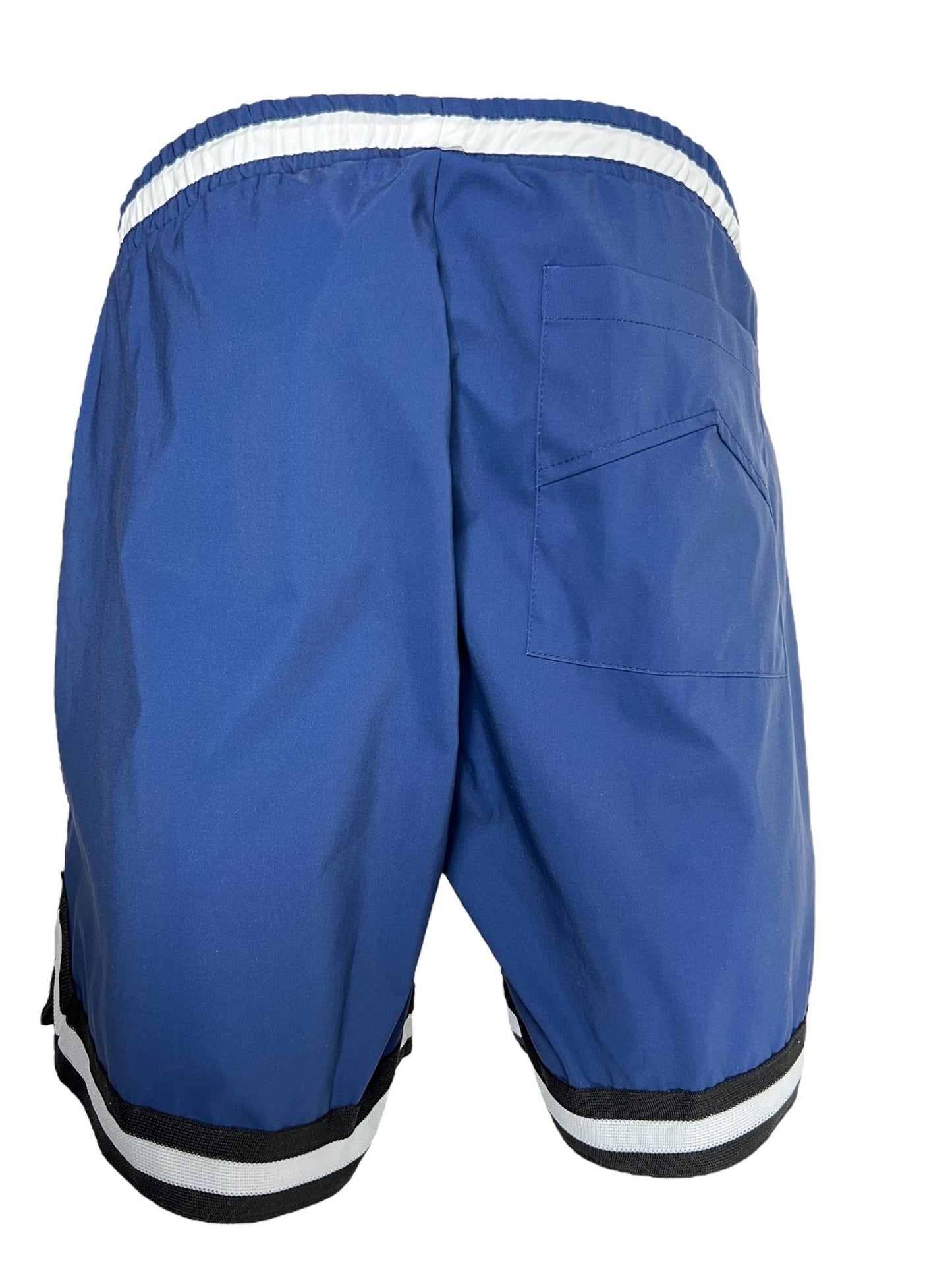 The Rhude Basketball Logo Swim Short Blu by RHUDE are blue athletic shorts with white and black trim. They feature an elasticated waistband and a back pocket, seamlessly blending sporty style with functionality, making them perfect for both casual outings and active days.