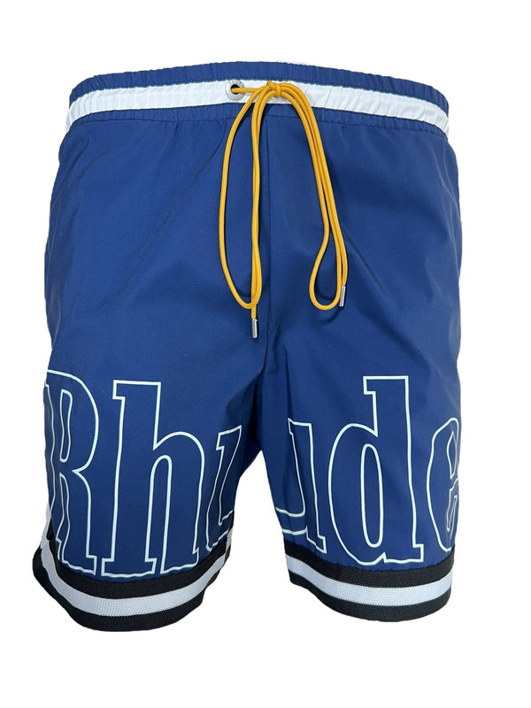 The Rhude Basketball Logo Swim Short Blu, by RHUDE, showcases an elasticated waistband with a yellow drawstring and bold white "Rhude" lettering on the front, all set against a blue fabric with a mustard tone.